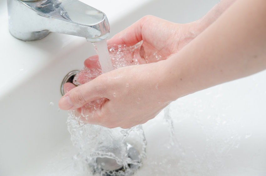 Washing hands with water